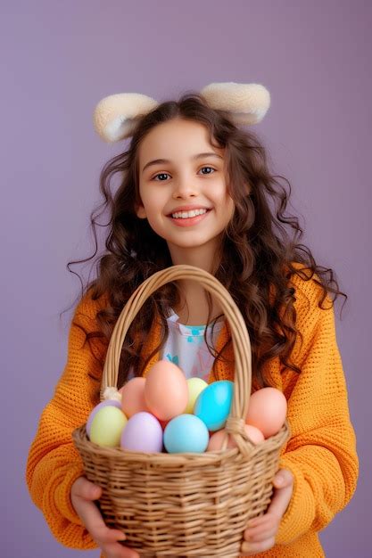 Premium Photo A Little Girl Holding A Basket With Eggs