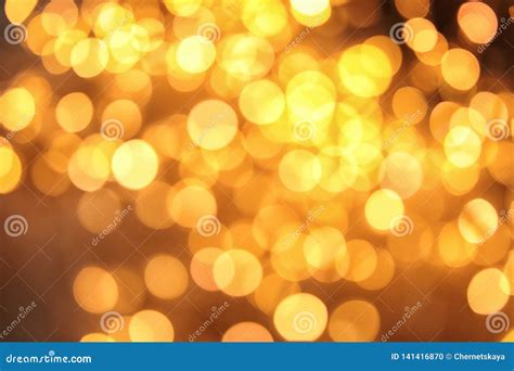 Gold Glitter With Bokeh Effect On Dark Stock Photo Image Of Abstract