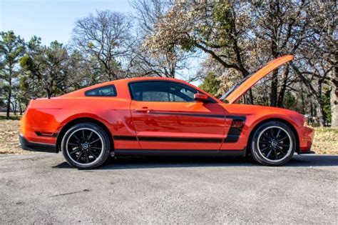 2012 Competition Orange Boss 302 Mustang 1zvbp8cu1c5243161