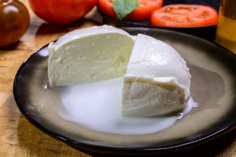 White Ball Of Italian Soft Cheese Mozzarella Di Bufala Campana Served