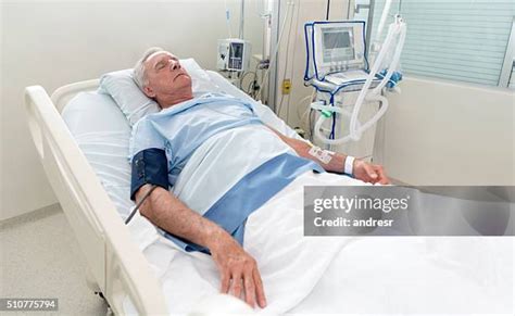 Man Sleeping On A Hospital Bed Photos And Premium High Res Pictures