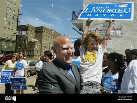 Mitch Landrieu Lieutenant Governor of Louisiana and candidate for mayor holds his son William ...