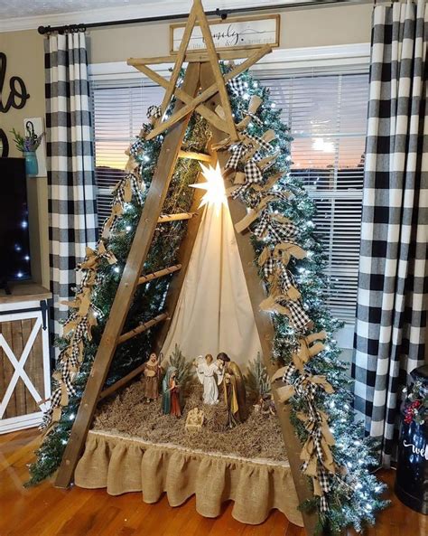 A Nativity Scene In The Corner Of A Living Room With Christmas Trees