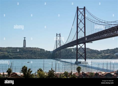 View Of The Tagus River Rio Tejo The Ponte De Abril Bridge And