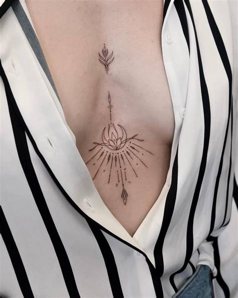 Ornamental Lotus Flower Tattoo Located On The Sternum