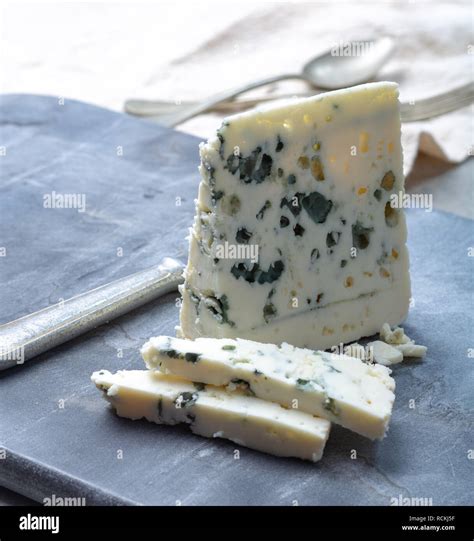 Piece Of French Blue Cheese Roquefort Made From Sheep Milk In Caves Of