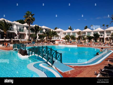 Swimming Pool At H10 Ocean Suites Hotel In Corralejo Fuerteventura Canary Islands Spain Stock