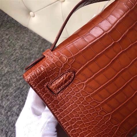 Saudi Arabia Bahrain Hermes Mini Kelly Pochette Alligator Matt Saddle