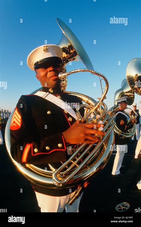 Tuba Player For The United States Marine Corp Marching Band Aboard The