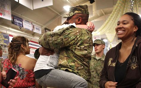 Welcome Back! 24 Heartwarming Photos of Soldiers Coming Home - Parade