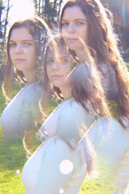 Premium Photo Multiple Exposure Image Of Woman At Grassy Field