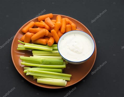 Baby Carrotscelery Sticks And Ranch Dressing — Stock Photo © Yelo34