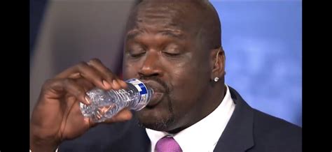 Shaq holding a water bottle : ShaqHoldingThings