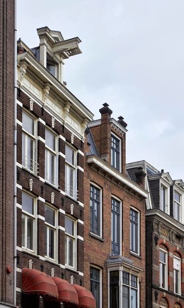 Holanda Amsterdam La Fachada De Antiguas Casas De Piedra Privadas En