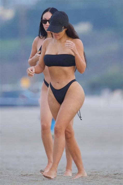 Kim Kardashian Shows Us Her Big Ass In A Black Bikini On Malibu