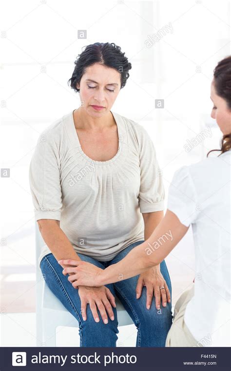 Hypnotized Woman With Her Therapist Stock Photo Alamy