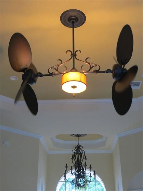 Twin Star Dual Ceiling Fan with Silk Shade light kit lit up | Ceiling ...