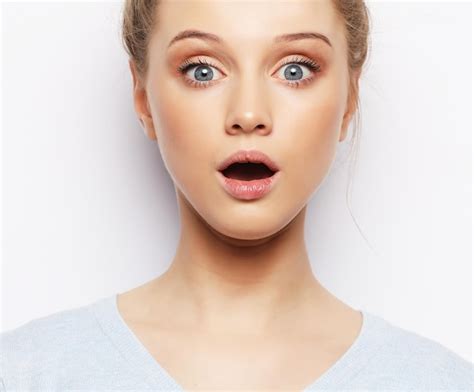Premium Photo Indoor Shot Of Stupefied Shocked Blonde Woman Keeps