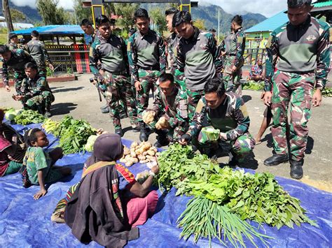 Satgas 330 Gelar BOHAI Di Hari Pasar Efektif Bantu Gerakkan Roda