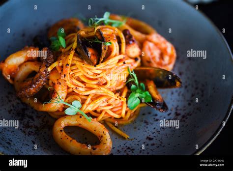 Delicious Italian Spaghetti With Fresh Seafood And Tasty Vegetables Stock