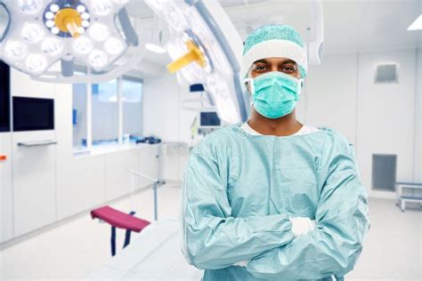 Indian Male Doctor Or Surgeon Over Operating Room Stock Photo Image