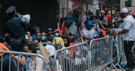 Migrants Sleep On The Sidewalk The Face Of A Failing Shelter System