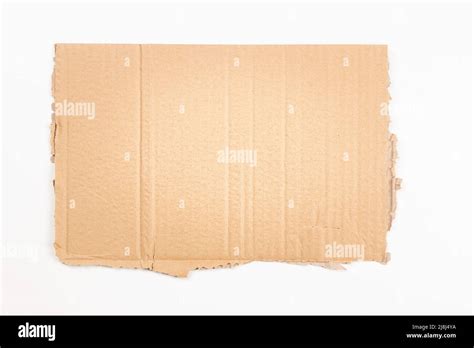 Piece Of Brown Corrugated Cardboard Isolated On White Background