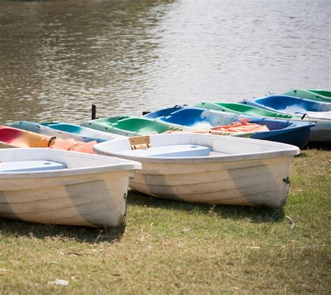 Premium Photo Boats Moored In Lake