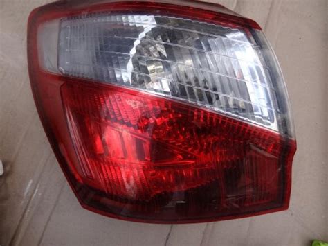 LAMPA LEWA TYLNA TYŁ NISSAN QASHQAI 2 J10 LIFT 12843576341