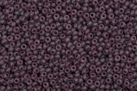 Premium Photo Multicolored Purple Seed Beads Background