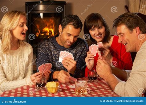 Group Of Couples Playing Cards Together Stock Image Image Of Alps