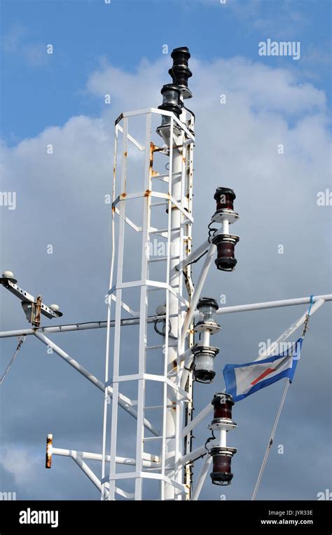 mast head navigation lights on the mast of a ship for safety at sea Stock Photo - Alamy