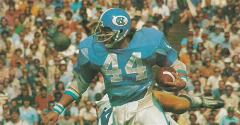 UNC football uniforms through the years.