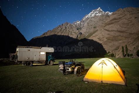 Motorhome, Sidecar Motorcycle and Tent, Camping in the Mountains Stock ...