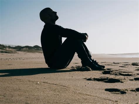 Premium Photo Silhouette Of A Young Man Breathing Deep Fresh Air On