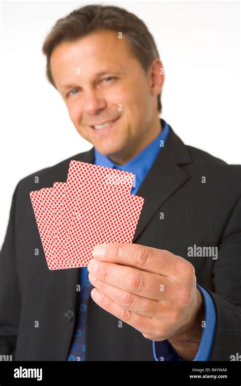 Businessman Holding Playing Cards Stock Photo Alamy