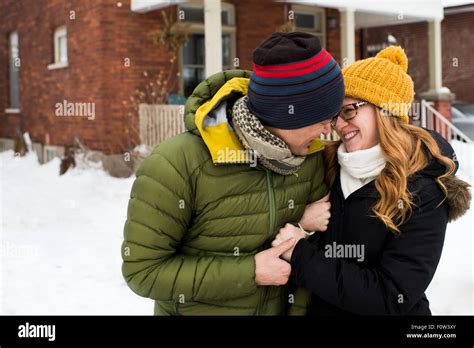 Couple hugging in winter hi-res stock photography and images - Alamy