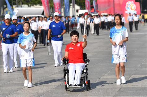 全国第十届残运会暨第七届特奥会圣火采集 火炬传递仪式举行