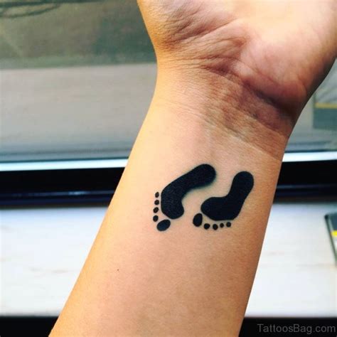 Adorable Baby Footprint Tattoos On Wrist Tattoo Designs