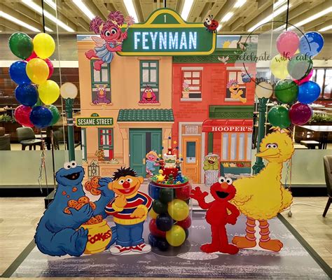 Cake and Backdrop Sesame Street themed Dessert Table