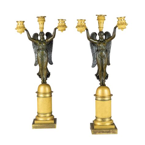 A Fine Quality Pair Of French Empire Style Gilt And Patinated Bronze
