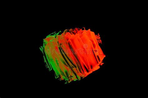 Green Orange Color Paint Splotches On Black Background Stock Photo