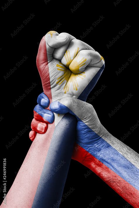 Russia VS philippines, Fist painted in colors of philippines flag, fist ...