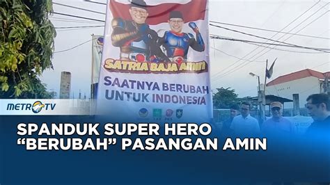 Aksi Unik Kampanye Dengan Spanduk Super Hero Berubah Pasangan Amin