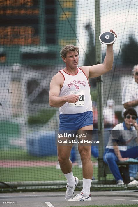 Al Oerter Of The Usa Throws The Discus During The 1989 World News