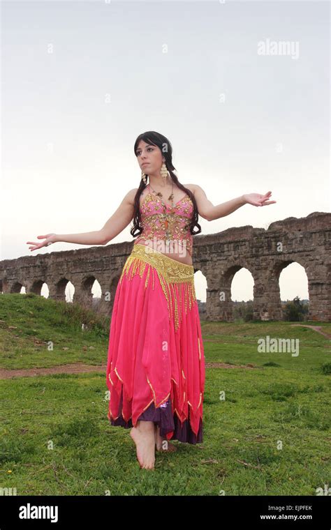 Belly Dancer With Ancient Roman Aqueducts Ruins Stock Photo Alamy