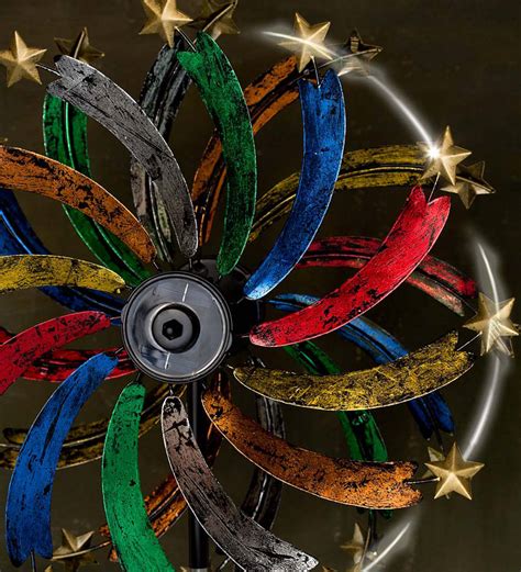 Multi-Colored Metal Wind Spinner with Stars and Solar Lights | Eligible ...