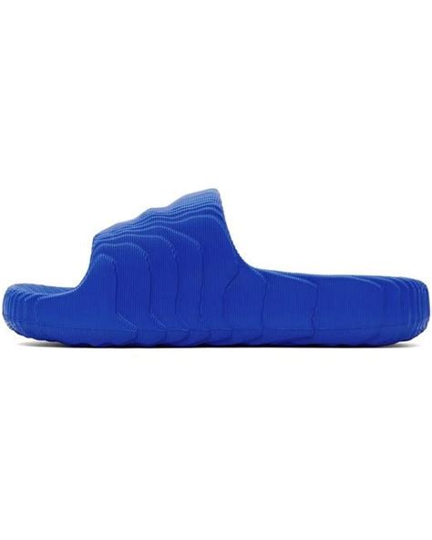 Adidas Originals Blue Adilette 22 Slides For Men Lyst Uk