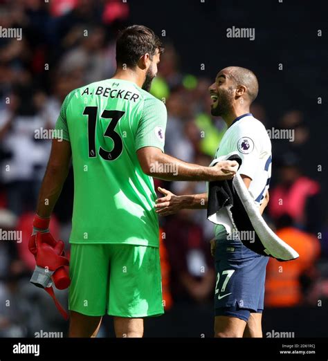 Liverpool Goalkeeper Alisson Becker Left And Tottenham Hotspur S