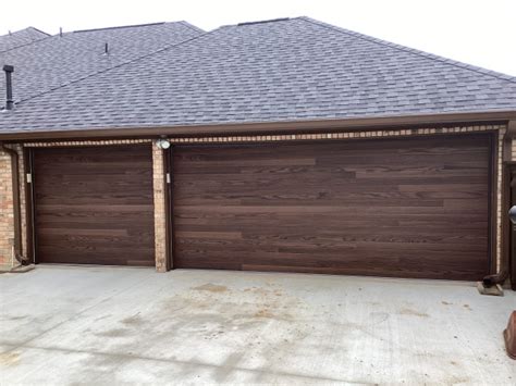 Dark Oak Plank Panel Garage Doors Contemporary Garage Dallas By